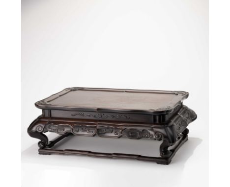 A CHINESE WOOD TABLE WITH 'FLOWER' DESIGN ； Please note: in-house shipping cannot be arranged for this item, bidders need to 