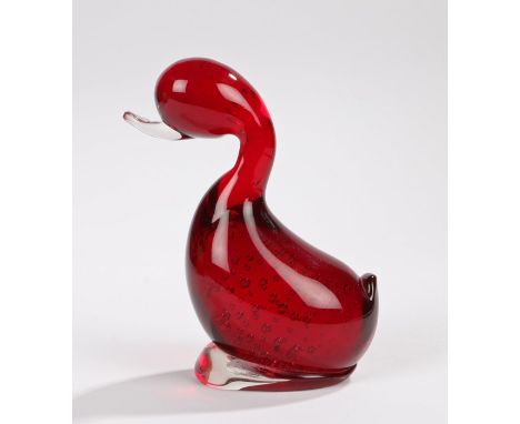 Ruby and clear glass paperweight, modelled as a stylised duck, 13cm highSurface scratches, old sticker mark to foot