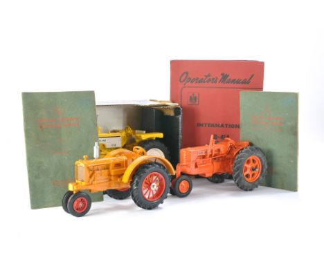 A trio of larger scale American tractors including CASE and Molene plus a trio of tractor manuals. 