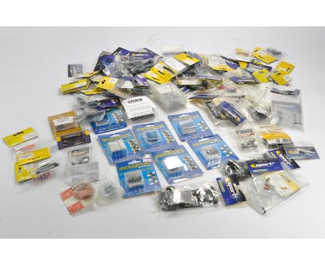Scalextric Slot Car interest comprising a large assortment of parts and components, including digital converters, chassis, ma