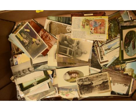 A mixed collection of printed materials to include postcards of varying ages to include late 19th century, Elvis Presley stam