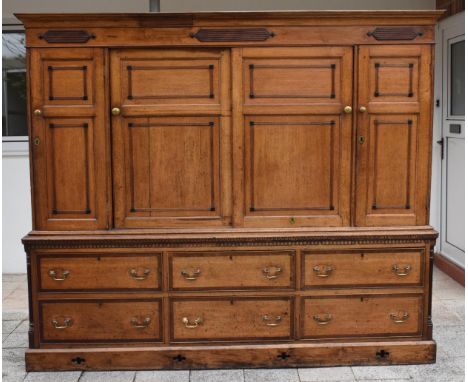 George III light oak housekeepers cupboard, the upper section with 4 cupboards over 6 drawer base. 232cm long 52cm deep and 1