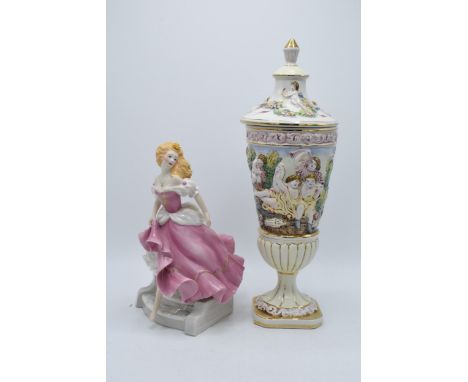 A pair of pottery items to include Franklin Mint figurine Cinderella and an R Capodimonte lidded urn (2). 41cm tallest.  In g