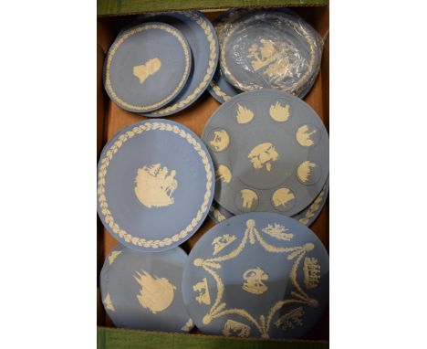 A collection of Wedgwood light blue Jasperware plates to include London, Christmas plates etc (11 pieces).  In good condition