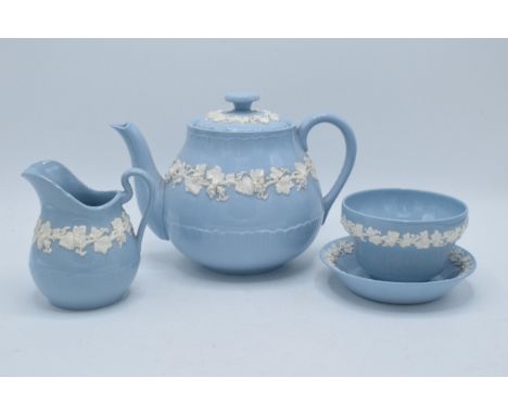 A collection of Wedgwood Queensware to include a teapot, cream jug, sugar bowl and a similar dish (4).  In good condition wit