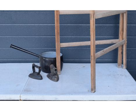 A collection of vintage household items to include a wooden clothes horse, enamel cooking pot and 2 metal irons (4).  