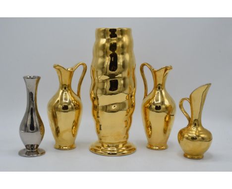 A collection of Royal Winton Grimwades jugs and vases in gold and silver lustres (5). Tallest 26cm tall.  In good condition w