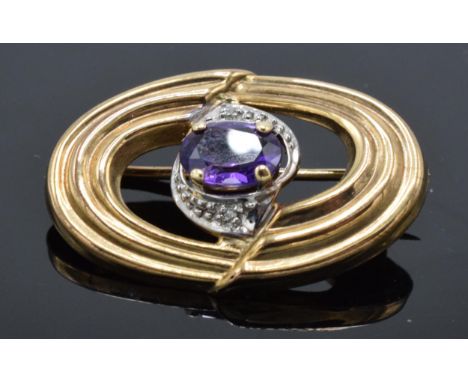 9ct gold amethyst oval brooch, 2.4 grams. 