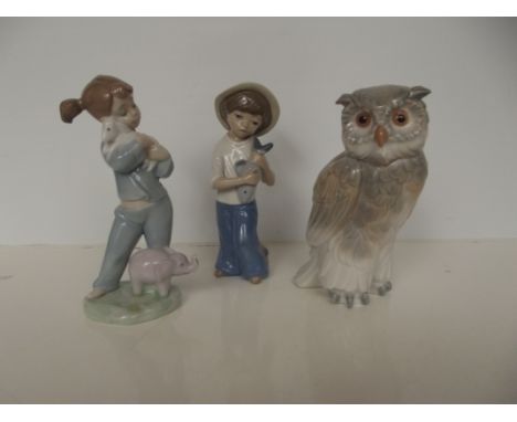 Nao owl, Nao girl and a further Spanish figure 