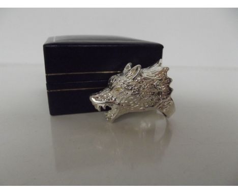 Silver ring in the form of a wolf 