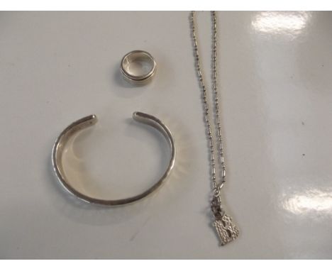 Silver torque bangle, silver pendant and necklace and silver dress ring 