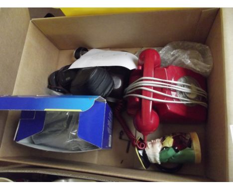 Red vintage telephone and other vintage cameras