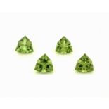 Lot 4 lose Peridots, ca. 4.66 ct, facett. Triangeln