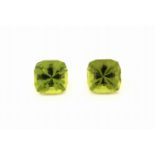 Lot 2 lose Peridots, zus. ca. 4.86 ct, facett.Kissen