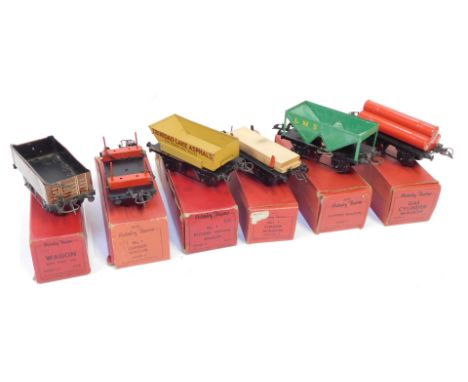 Hornby O gauge tinplate rolling stock, comprising gas cylinder wagon, No 1 timber wagon, wagon with sheet rail, hopper wagon,