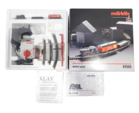 A Marklin Mini Club Z gauge freight starter set, including oval track switched mode power pack and locomotive controller, DB 