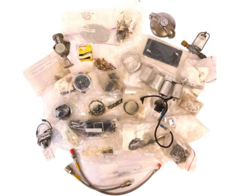 A group of automobile related parts, to include Jaguar window runners,  bulbs, rods, clips, etc. (1 tray) 