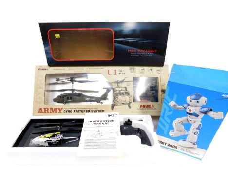 A UD RC U1 3.5 channel RC helicopter, a four channel mini invader helicopter, and a Cady Wida gesture controlled robot, boxed
