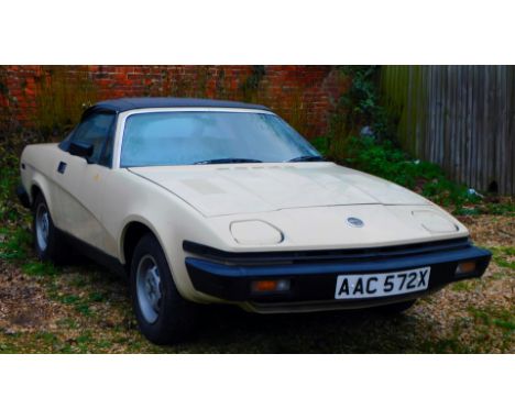 A Triumph TR7, registration AAC572X, in cream with soft top lid, spare alloy, manual, first registered 26/07/1982, 2 former k