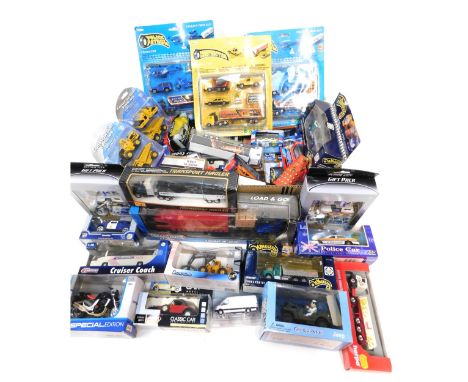 Maisto Teamsters Real Toy and other diecast vehicles, including a police patrol set, Maisto Kawasaki Z1000, a Laurel and Hard