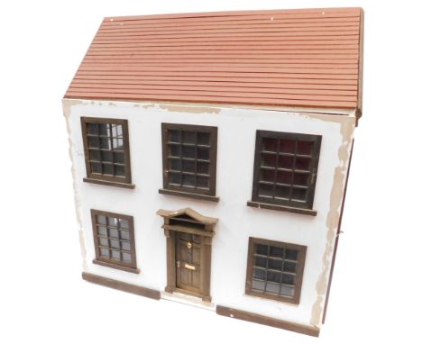 A Georgian style doll's house and furniture. 