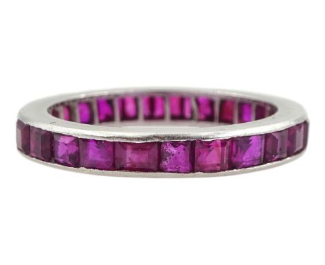 Platinum calibre cut ruby full eternity ring