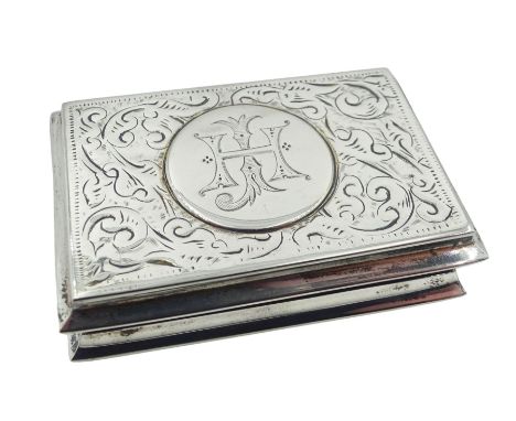 Edwardian silver snuff box, of rectangular form with engraved monogram in circular panel to cover, and engraved scrollwork to