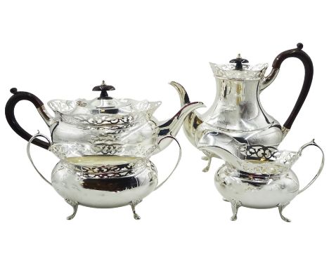 1960's four piece silver tea service, comprising teapot, hot water pot, milk jug, and twin handled open sucrier, each of oval