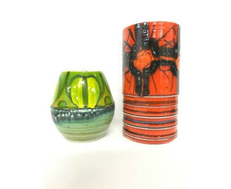 A Poole Pottery Delphis carved and glazed earthenware vase, shape 84, decorated by Veronica Hanson together with a green shap