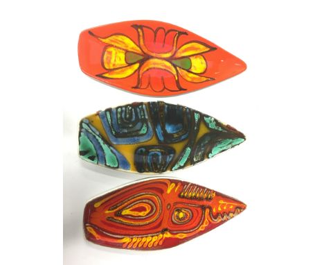 A Poole Pottery Delphis earthenware spear dish, shape 82 by Jean Millership (17 inches) together with two others.