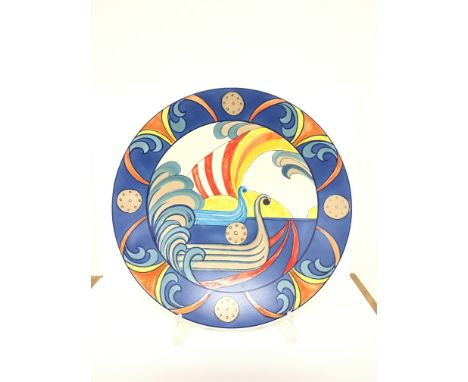 A Poole Pottery Studio Limited Edition dish, designed and painted by Karen Brown in the "Swanage Viking" design (16 inches).