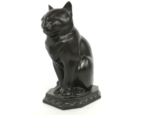 A Carter Stabler Adams Poole Pottery earthenware molded figure of a Seated Cat, possibly designed by John Adams, circa 1930's