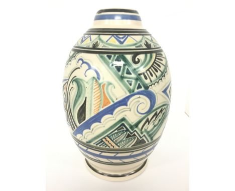 A large traditionally decorated lamp base, possibly Carter Stabler Adams, decorated in a Truda Carter style of geometric deco