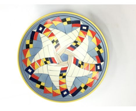 A Poole Pottery Studio Flags dish, designed by Sally Tuffin, date to base 1998 (14 inches diameter).