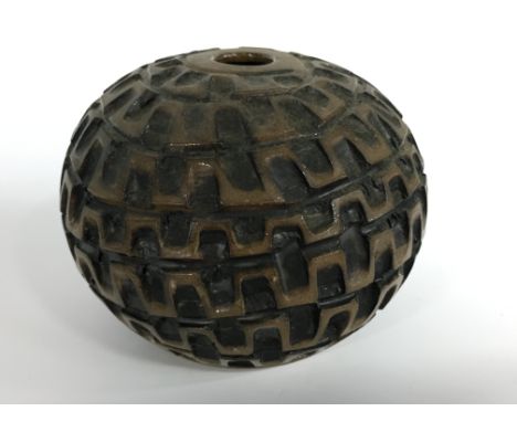 A Poole Pottery Atlantis stoneware desk pebble, carved and glazed by Beatrice Bolton (4 inches high).