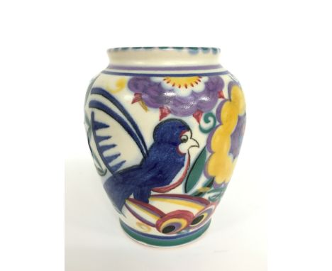 A Poole Pottery red bodied traditional vase, decorated in the QB Comical Bluebird design by Ethel Barrett (6 inches high).
