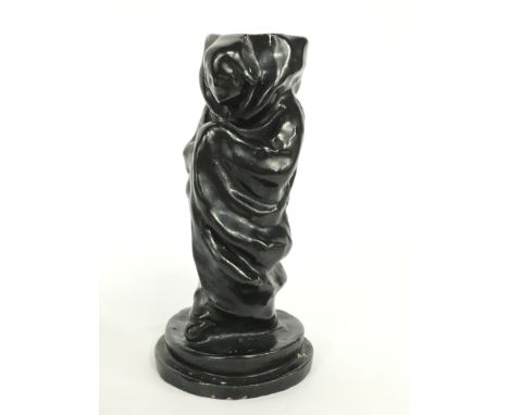A Carter & Co. stoneware early candlestick modelled by Joseph Roelants in the style of a Belgian Female Peasant, finished in 