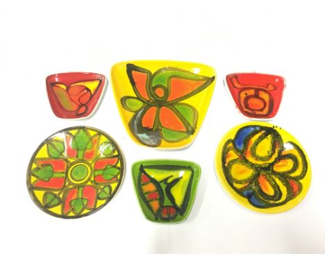 A Poole Pottery Delphis pin dish, shape 49, decorated by Janet Laird together with another pin dish and four trinket dishes.