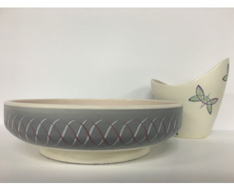 A Poole Pottery Freeform vase, decorated in the PT design by Iris Downton (7 inches) together with a bowl in the PRP design.