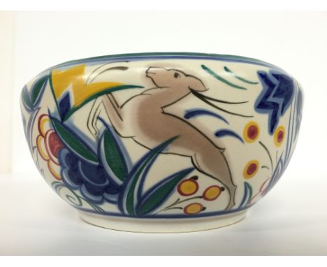 A Poole Pottery red bodied traditional bowl, decorated in the TZ Leaping Gazelle design, painted by Hilda Hampton (8 inches d