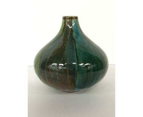 A Poole Pottery Studio vase, shape 10, of ovoid Onion form, shape designed by Robert Jefferson, cira 1963 - 66, decorated wit