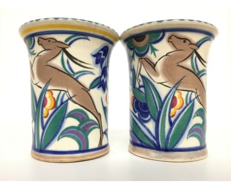 A pair of Poole Pottery red bodied Traditional vases, shape 115, decorated in the TZ Leaping Gazelle design, painted by Vera 