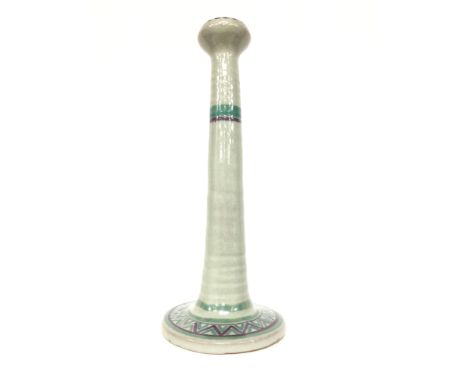 A large Carter Stabler Adams Poole Pottery red bodied Transitional Ware candlestick, decorated in the LY design by Anne Hatch