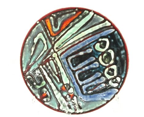 A Poole Pottery Delphis dish, shape 4, in an Abstract design in early glaze palette (10 inches diameter).