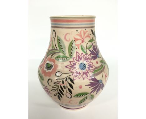 A Poole Pottery earthenware vase, shape 203, decorated in the Traditional TH design, painted by Ruth Paveley (9 inches high).