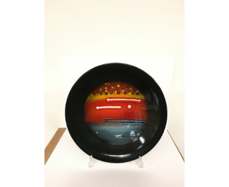 A Poole Pottery Living Glaze Planets Limited Edition dish, designed by Alan Clarke "JUPITER" No. 72 with box (16 inches).