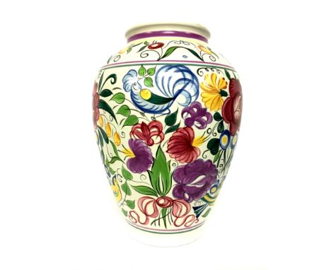 A Poole Pottery earthenware tradition vase, decorated in the LE design, circa 1960's, painted by Nellie Blackmore (14 inches)