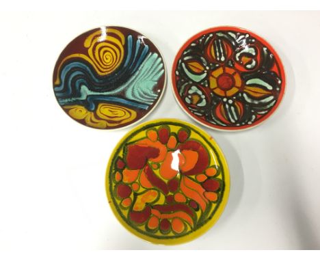 A good early Poole Pottery Delphis dish, shape 8, decorated in an early palette by Jean Millership (8 inches) together with t
