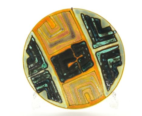 A Poole Pottery Delphis dish, shape 4, in an abstract design in early textured glazes by Geraldine O'Meara, blue backstamp (1