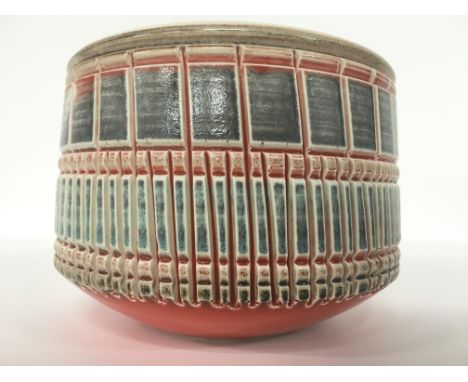 A Poole Pottery Delphis carved and glazed planter, shape 92 by Geraldine O'Meara together with an Aegean footed bowl.